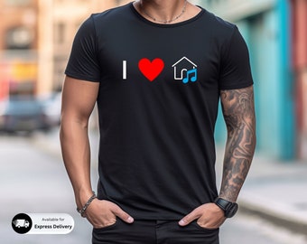 May include: A black t-shirt with a white graphic that says "I love home & music". The graphic includes a red heart, a house, and a blue musical note.