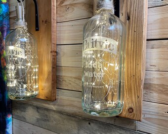 Par de linternas hechas con botellas de refresco