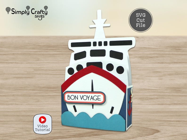 May include: A papercraft ship with a red and white front, blue sides, and a mast. The ship has the words "BON VOYAGE" on the front. The image also includes the text "SVG Cut File" and "Video Tutorial".