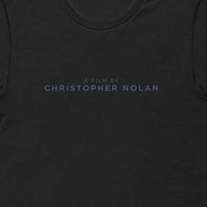 Christopher Nolan A Film By uniseks T-shirt