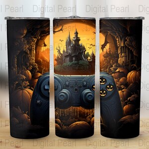 May include: A black and orange Halloween-themed tumbler with a video game controller graphic. The controller is surrounded by pumpkins and a spooky castle in the background.
