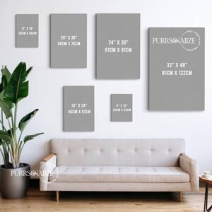 May include: A white wall with eight different sized gray canvases with white text on them. The canvases are arranged in a grid pattern. The text on the canvases shows the size of the canvas in inches and centimeters. The text on the canvases reads: 12" x 18", 30CM x 46CM, 20" x 30", 50CM x 76CM, 24" x 36", 61CM x 91CM, 18" x 24", 46CM x 61CM, 8" x 10", 20CM x 25CM, 32" x 48", 81CM x 122CM. The text "PURRSONALIZE" is on the canvas in the upper right corner. The text "PET PORTRAITS" is on the canvas in the upper right corner. The text "PAINTING" is on the canvas in the upper right corner.
