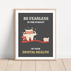 May include: A motivational poster with a cartoon tooth wearing a red cape and holding a toothbrush. The text reads "Be fearless in the pursuit of your dental health."