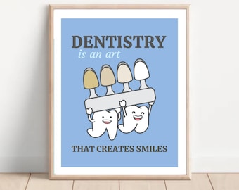 May include: A blue and white poster with the text "Dentistry is an art that creates smiles". The poster features a cartoon image of two teeth holding a tray of dental shades.