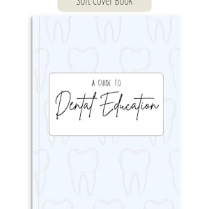 May include: A soft cover book with a pale blue background and a pattern of white teeth. The cover features a white rectangle with the text "A GUIDE TO Dental Education" in black script. The top of the book has the text "Soft Cover Book".