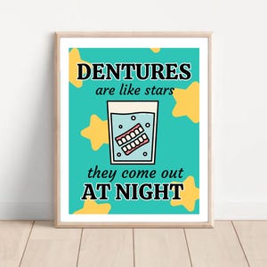 May include: A teal blue poster with yellow stars and the text "Dentures are like stars they come out at night". A cartoon image of dentures in a glass of water is in the centre of the poster.