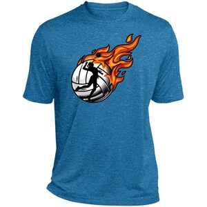 Puede incluir: Una camiseta azul con un gráfico de una jugadora de voleibol que golpea la pelota, envuelta en llamas.