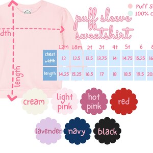 May include: A light pink puff sleeve sweatshirt. The image includes a size chart with chest width and length measurements in inches for sizes 12M to 10. Available colors are cream, light pink, hot pink, red, lavender, navy, and black. Made of 100% cotton.