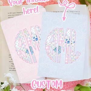 May include: Custom Kindle inserts in pink and blue with floral and gingham patterns. Each insert features a monogram with the text "Your initials here!" and "CUSTOM KINDLE INSERTS".