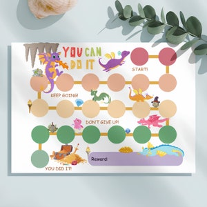 May include: A printable chart with a dragon theme for kids. The chart has a game board with circles and a path to follow. The text on the chart says "You Can Do It", "Start", "Keep Going", "Don't Give Up", and "You Did It!" There is a space for a reward at the end of the path.