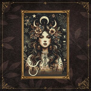 May include: A rectangular framed artwork featuring a portrait of a person with long wavy hair adorned with a floral crown and crescent moon symbols. The dark background includes celestial motifs, small stars, and the Taurus zodiac symbol in white.