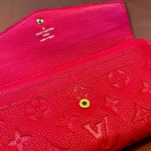 Cartera de mano larga Louis Vuitton Cureuse Monogram Empriente + estuche con certificado