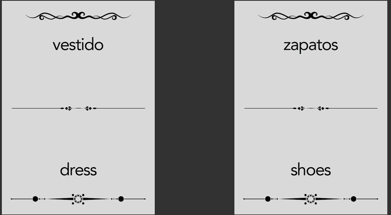 May include: Two flashcards with Spanish and English words for "dress" and "shoes". The Spanish words are "vestido" and "zapatos".
