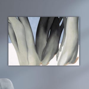 May include: An abstract painting featuring a close-up of several curved, elongated forms in shades of gray and black against a light blue and white background. The artwork is mounted on a wall, showcasing a modern aesthetic.