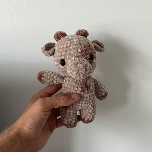 Crochet amigurumi small brown cow