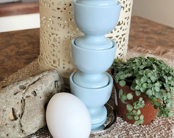 STACKABLE EGG CUP on chrome support. Set of 4. Stack and store egg cup. A very nice addition to your Easter brunch table. Blue grey.