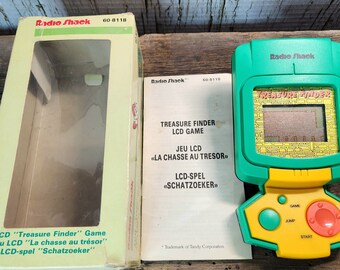 1990 RADIO SHACK Treasure Finder Game with is box and instructions, Lcd Radio Shack Vintage game. Vintage electronic Radio Shack game. 90s