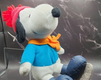 SNOOPY JINGLE BELL Plush. Son de cloche losque secoué. À l'origine était un ensemble cadeau avec chocolat (non inclus) 15 cm de haut Peanuts