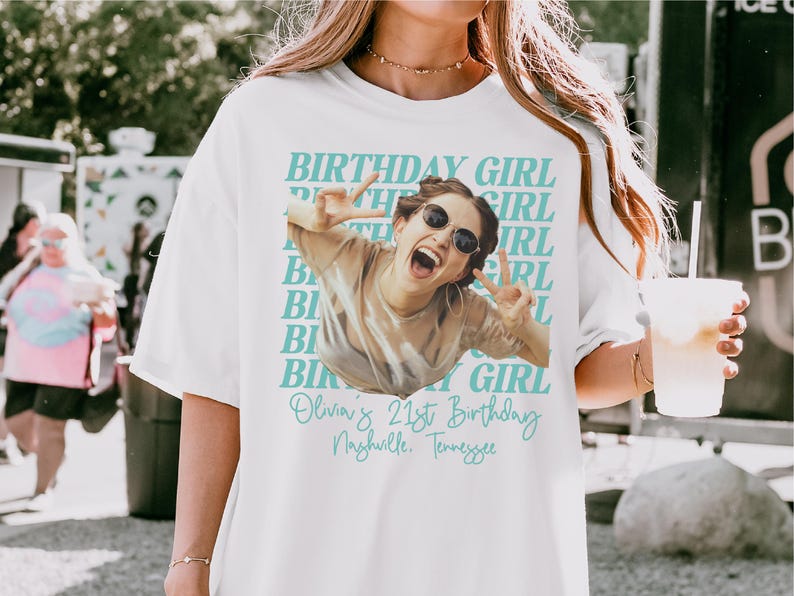 May include: White t-shirt with a photo of a woman wearing sunglasses and making a peace sign. The shirt has the words "BIRTHDAY GIRL" in a repeating pattern and "Olivia's 21st Birthday, Nashville, Tennessee" in script.