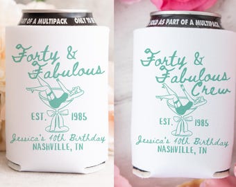 May include: White can cooler with teal text that reads "Forty & Fabulous" and "Jessica's 40th Birthday Nashville, TN". The design includes a woman in a martini glass and the year "1985".