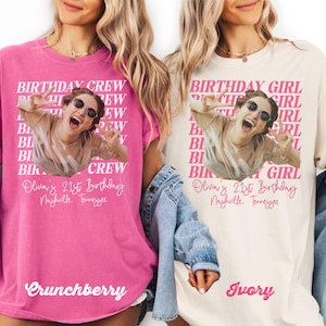 May include: Two t-shirts, one pink and one ivory, featuring a photo of a person wearing sunglasses and making a peace sign. The pink shirt says "Birthday Crew" and "Crunchberry." The ivory shirt says "Birthday Girl" and "Ivory."