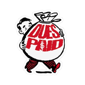 May include: A sticker featuring a cartoon illustration of a person carrying a large bag of money. The bag is white with the words "DUES PAID" in red, and a dollar sign. The person is wearing red and black checkered pants.
