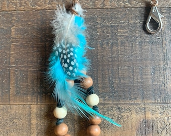 Keychain, The Susannah is handmade on leather cord with wood beads and natural feathers  great for key rings, backpacks, Abbott’s Giftware