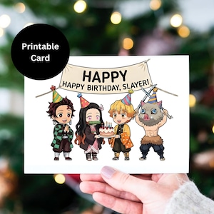 May include: A white printable birthday card featuring four anime-style characters wearing party hats. The card has the words "HAPPY HAPPY BIRTHDAY, SLAYER!" written on it. A black circle with the words "Printable Card" is in the upper left corner.