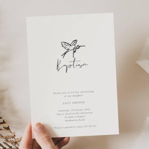 May include: A white card with black text and a simple line drawing of a hummingbird. The text reads "Kryptism" and includes the details for a christening: "Please join us for the christening of our daughter Lucy Thomas Saturday, 25 January 202X four o'clock in the afternoon St John's Chapel Manhattan Road Please respond to Anna: 123 123 123"