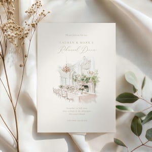 May include: A cream-colored invitation with watercolor illustration of a rehearsal dinner setting. The text reads "LAUREN & MARK'S Rehearsal Dinner" with event details below. The design features a chandelier and floral arrangements.