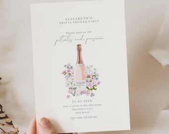 May include: A bridal shower invitation with a pink champagne bottle surrounded by pastel flowers. The invitation reads "Elizabeth's Bridal Shower Party" and "Please join us for petals and prosecco". The date is 25.05.202X, the time is four o'clock in the afternoon, and the location is Harrison's Cafe, 1234 Street.