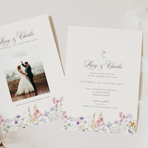 May include: Wedding invitation with a watercolor floral border. The invitation features the couple's names, "Lucy & Charlie", and the wedding date, "Saturday, 25 January 2025". The invitation also includes the wedding ceremony location, "St. James Chapel, Manhattan Road", and the website address, "www.lucycharliewed.com".