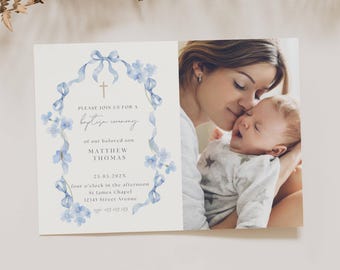 May include: Baptism invitation card with a watercolor floral design in light blue. The card features the text "PLEASE JOIN US FOR A baptism ceremony of our beloved son MATTHEW THOMAS". The right side of the card shows a mother kissing a baby.