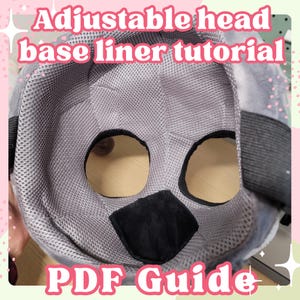 May include: A close-up view of the inside of a gray mesh head base liner with black fabric eye and nose openings. The text "PDF Guide" is visible at the bottom of the image.