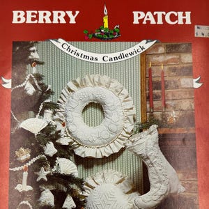 May include: A vintage Christmas pattern book titled "Berry Patch" with a red cover. The cover features a Christmas tree and decorative candlewick designs. The text "Christmas Candlewick" and "Original Claire Bryant Designs" are visible.