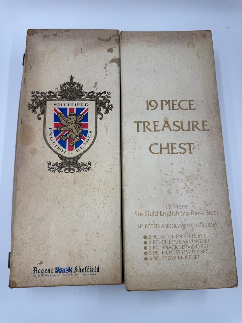 May include: A vintage 19-piece Sheffield English Stainless Steel treasure chest. The box is beige with text and a crest that reads "Sheffield English Blades." The chest includes kitchen, carving, snack, hostess, and steak knife sets.