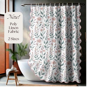 May include: A white shower curtain with a floral pattern of pink and purple flowers and green leaves. The curtain has a scalloped pink border and the text "New! Poly Linen Fabric 2 Sizes".