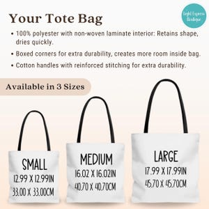 May include: Three white tote bags with black handles and black text. The bags are labeled "Small", "Medium", and "Large" with measurements in inches and centimeters. The text also says "Your Tote Bag" and "Available in 3 Sizes".