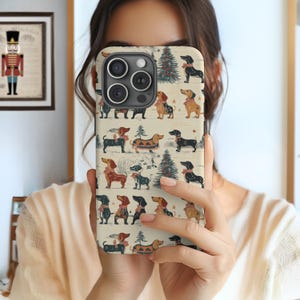 May include: A set of three ceramic mugs with a speckled, matte finish. Each mug features a different color: light blue, cream, and gray. The mugs have a simple, modern design and a comfortable handle.