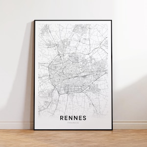 May include: Black and white line art map print of Rennes, France. The map shows the city streets and features the text "Rennes, France".