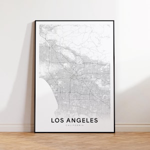 May include: A black and white map print of Los Angeles, California. The map shows the city's streets and roads in detail.