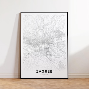 May include: A black and white line art map of Zagreb, Croatia. The map shows the city's streets and waterways. The city name and country are printed in black at the bottom of the map.