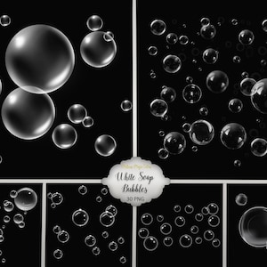 May include: A set of 30 transparent white soap bubbles of various sizes on a black background. The bubbles are arranged in different patterns and groupings.