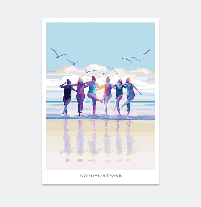 May include: A group of six women in colorful swimsuits and swim caps are walking in the shallow water of a beach. The women are holding hands and smiling. The sky is blue and there are seagulls flying overhead. The text "Together we are stronger" is at the bottom of the image.