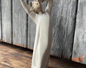 Lladro “Children in Pyjamas” retired figurine of yawning boy #4870