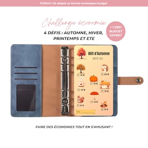 Peut inclure: Un classeur budgétaire bleu et beige avec un défi d'épargne saisonnier. Le classeur est ouvert, révélant une carte avec des illustrations sur le thème de l'automne et des objectifs d'épargne. Le texte comprend "Challenge économie" et "4 défis: Automne, Hiver, Printemps et Ete."