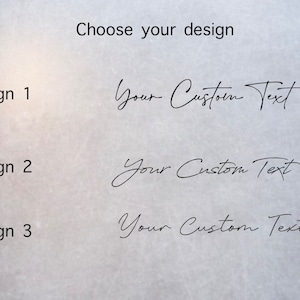 May include: Three different design options for a custom text graphic. The text "Your Custom Text" is shown in each design.