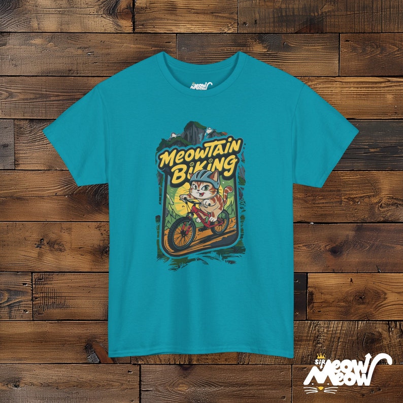 Meowtain Biking T-Shirt: Fun Cat Graphic Tee for Outdoor Lovers Tropical Blue