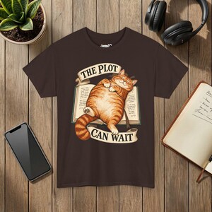 The Plot Can Wait Cat T-Shirt, Ginger Tabby on Book, Book Lover Gift Dark Chocolate