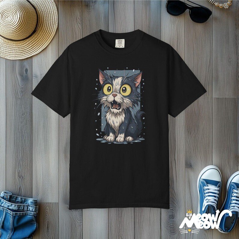 Funny Wet Cat T-Shirt: Wide-Eyed Kitty Graphic Tee Black